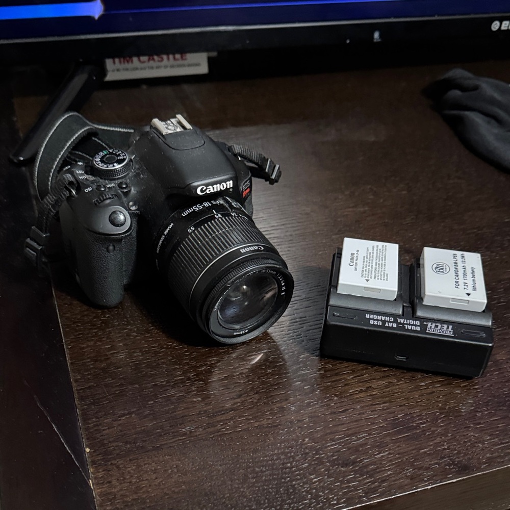 Canon Black DSLR with 18-55mm Kit Lens and Dual Battery Charger